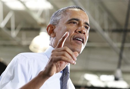 U.S. President Barack Obama delivers remarks on the economy at Costco Wholesale in Woodmore Towne Centre in Lanham, Maryland January 29, 201 U.S. President Barack Obama delivers remarks on the economy at Costco Wholesale in Woodmore Towne Centre in Lanham, Maryland January 29, 201