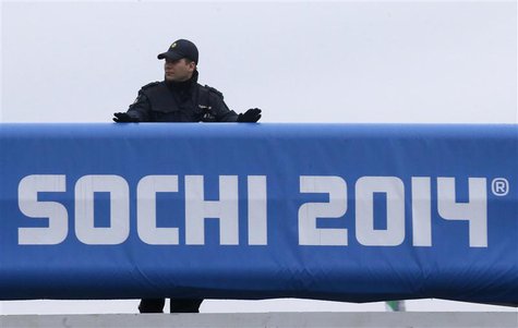 A Russian police officer keeps watch at the Olympic Park in the Adler district of Sochi January 29, 2014. REUTERS/Alexander Demianchuk A Russian police officer keeps watch at the Olympic Park in the Adler district of Sochi January 29, 2014. REUTERS/Alexander Demianchuk