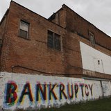 The word "Bankruptcy" is painted on the side of a building in Detroit, Michigan in this October 25, 2013 file photo. REUTERS/Joshua Lott/Fil The word "Bankruptcy" is painted on the side of a building in Detroit, Michigan in this October 25, 2013 file photo. REUTERS/Joshua Lott/Fil