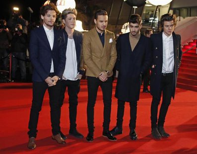 British boy band One Direction arrives at the Cannes festival palace to attend the NRJ Music Awards in Cannes December 14, 2013. REUTERS/Eri British boy band One Direction arrives at the Cannes festival palace to attend the NRJ Music Awards in Cannes December 14, 2013. REUTERS/Eri