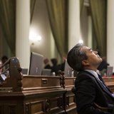 California Assemblymember Al Muratsuchi (D-Los Angeles) listens to arguments in favor and opposition to AB10, a bill that raises the Califor California Assemblymember Al Muratsuchi (D-Los Angeles) listens to arguments in favor and opposition to AB10, a bill that raises the Califor