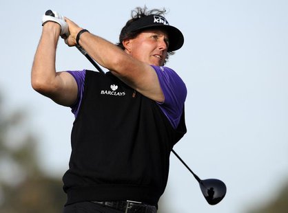 Jan 23, 2014; La Jolla, CA, USA; Phil Mickelson hits his tee shot from the ninth hole during the first round of the Farmers Insurance Open g Jan 23, 2014; La Jolla, CA, USA; Phil Mickelson hits his tee shot from the ninth hole during the first round of the Farmers Insurance Open g