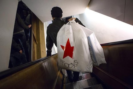 Shoppers ride the escalator at Macy's Herald Square in New York in this November 28, 2013 file photo. REUTERS/Eric Thayer Shoppers ride the escalator at Macy's Herald Square in New York in this November 28, 2013 file photo. REUTERS/Eric Thayer