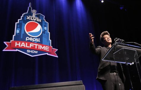 Singer Bruno Mars speaks at the Super Bowl half time press conference in New York January 30, 2014. REUTERS/Andrew Kelly Singer Bruno Mars speaks at the Super Bowl half time press conference in New York January 30, 2014. REUTERS/Andrew Kelly