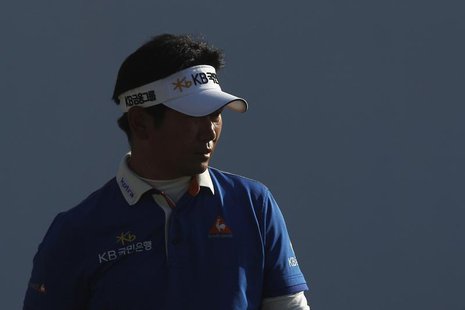 Yang Yong-eun of South Korea walks on the 18th hole during the third round of the Hong Kong Open golf tournament at the Hong Kong golf club Yang Yong-eun of South Korea walks on the 18th hole during the third round of the Hong Kong Open golf tournament at the Hong Kong golf club
