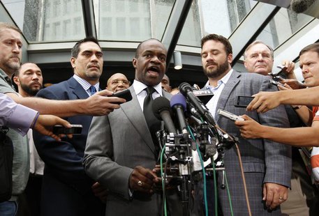 Executive director of the NFL Players Association DeMaurice Smith (C) speaks outside the NFL Players Association Headquarters in Washington Executive director of the NFL Players Association DeMaurice Smith (C) speaks outside the NFL Players Association Headquarters in Washington