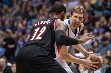 Jan 18, 2014; Dallas, TX, USA; Portland Trail Blazers power forward LaMarcus Aldridge (12) guards Dallas Mavericks power forward Dirk Nowitz Jan 18, 2014; Dallas, TX, USA; Portland Trail Blazers power forward LaMarcus Aldridge (12) guards Dallas Mavericks power forward Dirk Nowitz