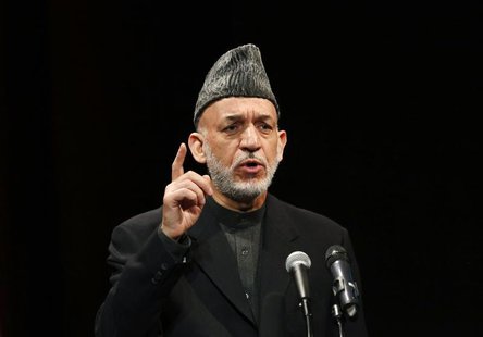 Afghan President Hamid Karzai speaks during the opening of the Bayat Media Centre in Kabul January 21, 2014. REUTERS/Mohammad Ismail Afghan President Hamid Karzai speaks during the opening of the Bayat Media Centre in Kabul January 21, 2014. REUTERS/Mohammad Ismail