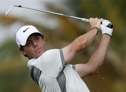 Rory McIlroy of Northern Ireland tees off on the fourth hole during the second round of the 2014 Omega Dubai Desert Classic in Dubai January Rory McIlroy of Northern Ireland tees off on the fourth hole during the second round of the 2014 Omega Dubai Desert Classic in Dubai January