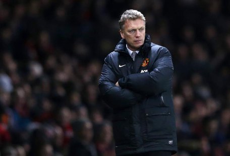 Manchester United's manager David Moyes watches during their English Premier League soccer match against Cardiff City at Old Trafford in Man Manchester United's manager David Moyes watches during their English Premier League soccer match against Cardiff City at Old Trafford in Man