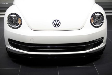 The Volkswagen logo is displayed on a 2014 Beetle TDI during the North American International Auto Show in Detroit, Michigan January 15, 201 The Volkswagen logo is displayed on a 2014 Beetle TDI during the North American International Auto Show in Detroit, Michigan January 15, 201
