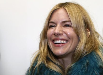 Actress Sienna Miller arrives for the Matthew Williamson Spring/Summer 2014 collection presentation during London Fashion Week September 15, Actress Sienna Miller arrives for the Matthew Williamson Spring/Summer 2014 collection presentation during London Fashion Week September 15,