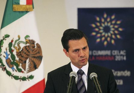Mexico's President Enrique Pena Nieto addresses the media in Havana January 29, 2014. REUTERS/Stringer Mexico's President Enrique Pena Nieto addresses the media in Havana January 29, 2014. REUTERS/Stringer
