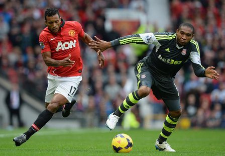 Manchester United's Nani (L) challenged by Stoke City's Wilson Palacios during their English Premier League soccer match at Old Trafford Sta Manchester United's Nani (L) challenged by Stoke City's Wilson Palacios during their English Premier League soccer match at Old Trafford Sta