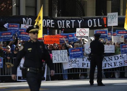 Protesters against the proposed Keystone pipeline hold placards across the street from where U.S. President Barack Obama was to hold a Democratic Party fundraiser, in San Francisco November 25, 2013.
CREDIT: REUTERS/JASON REED Protesters against the proposed Keystone pipeline hold placards across the street from where U.S. President Barack Obama was to hold a Democratic Party fundraiser, in San Francisco November 25, 2013.
CREDIT: REUTERS/JASON REED