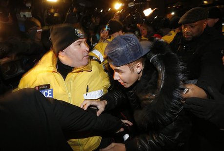 Pop singer Justin Bieber arrives at a police station to face assault charges in Toronto in this file photo taken January 29, 2014. REUTERS/A Pop singer Justin Bieber arrives at a police station to face assault charges in Toronto in this file photo taken January 29, 2014. REUTERS/A