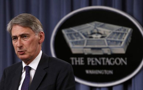 British Defense Secretary Philip Hammond and U.S. Defense Secretary Chuck Hagel (not pictured) hold a joint news conference at the Pentagon British Defense Secretary Philip Hammond and U.S. Defense Secretary Chuck Hagel (not pictured) hold a joint news conference at the Pentagon