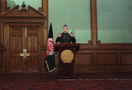 Afghan President Hamid Karzai speaks during a news conference in Kabul January 25, 2014. REUTERS/Mohammad Ismail Afghan President Hamid Karzai speaks during a news conference in Kabul January 25, 2014. REUTERS/Mohammad Ismail