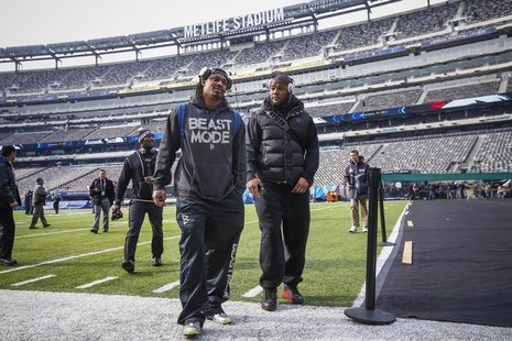 Seattle Seahawks running back Marshawn Lynch (C) walks off the field at the MetLife Stadium during their NFL Super Bowl XLVIII walk-through Seattle Seahawks running back Marshawn Lynch (C) walks off the field at the MetLife Stadium during their NFL Super Bowl XLVIII walk-through