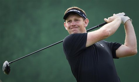 Stephen Gallacher from Scotland takes his tee shot on the 2nd hole of the 2014 Omega Dubai Desert Classic in Dubai February 2, 2014. REUTERS Stephen Gallacher from Scotland takes his tee shot on the 2nd hole of the 2014 Omega Dubai Desert Classic in Dubai February 2, 2014. REUTERS