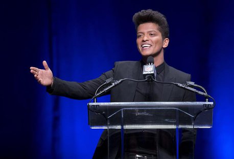 Singer Bruno Mars speaks at the Super Bowl half time press conference in New York January 30, 2014. REUTERS/Carlo Allegri Singer Bruno Mars speaks at the Super Bowl half time press conference in New York January 30, 2014. REUTERS/Carlo Allegri