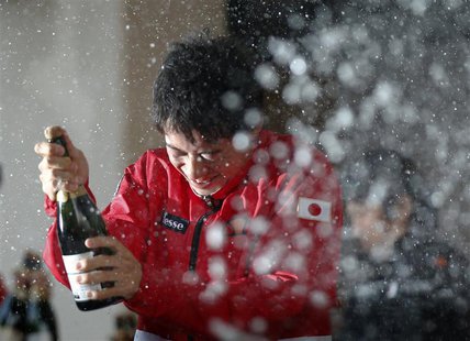 Champagne is sprayed on Japan's Kei Nishikori by his teammates as they celebrate their victory over Canada at their Davis Cup world group fi Champagne is sprayed on Japan's Kei Nishikori by his teammates as they celebrate their victory over Canada at their Davis Cup world group fi