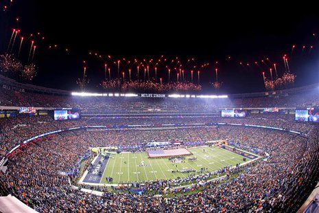 East Rutherford, NJ, USA; Fireworks go off during the playing of the national anthem before Super Bowl XLVIII between the Seattle Seahawks a East Rutherford, NJ, USA; Fireworks go off during the playing of the national anthem before Super Bowl XLVIII between the Seattle Seahawks a