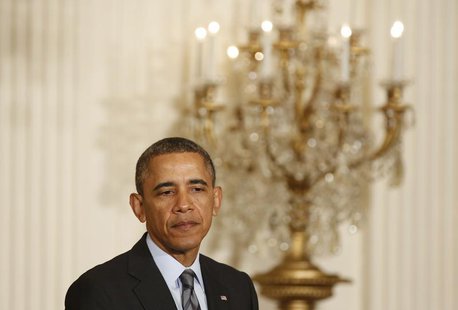 U.S. President Barack Obama pauses as he discusses unemployment, in the East Room of the White House in Washington, January 31, 2014. REUTER U.S. President Barack Obama pauses as he discusses unemployment, in the East Room of the White House in Washington, January 31, 2014. REUTER