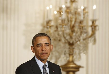 U.S. President Barack Obama pauses as he discusses unemployment, in the East Room of the White House in Washington, January 31, 2014. REUTER U.S. President Barack Obama pauses as he discusses unemployment, in the East Room of the White House in Washington, January 31, 2014. REUTER