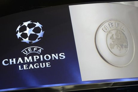 The UEFA Champions League logo is seen during the draw ceremony for the 2013/2014 Champions League Cup soccer competition at Monaco's Grimal The UEFA Champions League logo is seen during the draw ceremony for the 2013/2014 Champions League Cup soccer competition at Monaco's Grimal