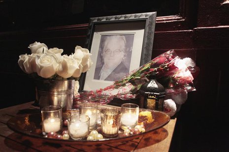 Flowers and candles are laid at a memorial for actor Philip Seymour Hoffman outside Philip Marie Restaurant and bar on Hudson Street in Manh Flowers and candles are laid at a memorial for actor Philip Seymour Hoffman outside Philip Marie Restaurant and bar on Hudson Street in Manh