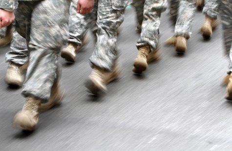 U.S. army soldiers are seen marching in the St. Patrick's Day Parade in New York, March 16, 2013. REUTERS/Carlo Allegri U.S. army soldiers are seen marching in the St. Patrick's Day Parade in New York, March 16, 2013. REUTERS/Carlo Allegri