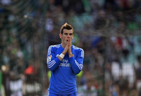 Real Madrid's Gareth Bale reacts after missing a scoring opportunity against Real Betis during their Spanish First Division soccer match at Real Madrid's Gareth Bale reacts after missing a scoring opportunity against Real Betis during their Spanish First Division soccer match at