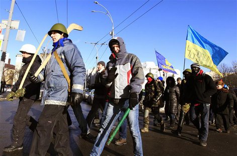 Anti-government protesters march on the streets in Kiev February 4, 2014. REUTERS/Vasily Fedosenko Anti-government protesters march on the streets in Kiev February 4, 2014. REUTERS/Vasily Fedosenko