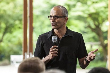 Satya Nadella, executive vice president, Cloud and Enterprise, addresses employees during the One Microsoft Town Hall event in Seattle, Wash Satya Nadella, executive vice president, Cloud and Enterprise, addresses employees during the One Microsoft Town Hall event in Seattle, Wash