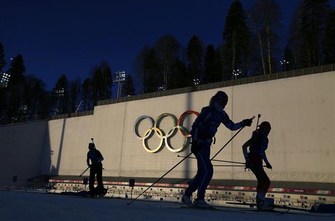 Olympic skiers take part in a biathlon training session for the 2014 Sochi Winter Olympic Games at the "Laura" cross-country and biathlon ce Olympic skiers take part in a biathlon training session for the 2014 Sochi Winter Olympic Games at the "Laura" cross-country and biathlon ce
