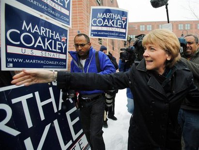 Democratic candidate for the U.S. Senate Martha Coakley (R) greets supporters outside the polling station where she cast her ballot in the s Democratic candidate for the U.S. Senate Martha Coakley (R) greets supporters outside the polling station where she cast her ballot in the s