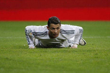 Real Madrid's Cristiano Ronaldo reacts during their Spanish King's Cup match against Espanyol at Santiago Bernabeu stadium in Madrid January Real Madrid's Cristiano Ronaldo reacts during their Spanish King's Cup match against Espanyol at Santiago Bernabeu stadium in Madrid January