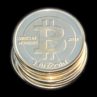 Physical Bitcoins (Photo from: Wikimedia Commons). Physical Bitcoins (Photo from: Wikimedia Commons).