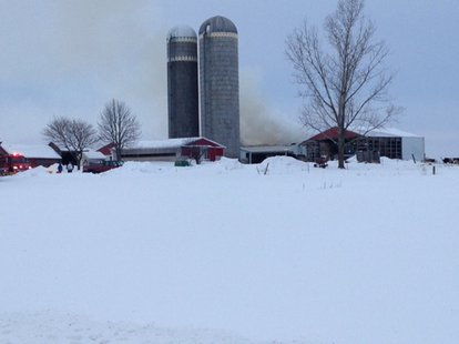 Firefighters respond to a barn fire in the village of Nichols, Tuesday, Feb. 4, 2014. (Photo from: FOX 11). Firefighters respond to a barn fire in the village of Nichols, Tuesday, Feb. 4, 2014. (Photo from: FOX 11).