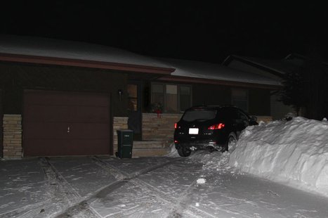An SUV crashed into a house on the 2500 block of N. Elinor St. in Appleton, Feb. 2, 2014. (Photo: Appleton Police Dept.) An SUV crashed into a house on the 2500 block of N. Elinor St. in Appleton, Feb. 2, 2014. (Photo: Appleton Police Dept.)