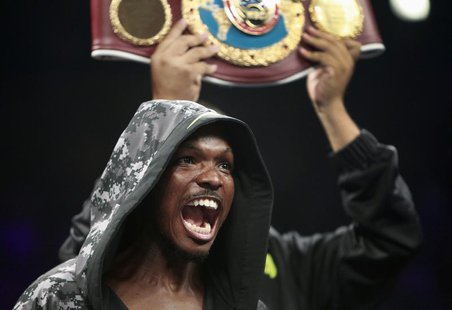 Undefeated WBO welterweight champion Timothy Bradley Jr. of the U.S. reacts after entering the ring for his title fight against Juan Manuel Undefeated WBO welterweight champion Timothy Bradley Jr. of the U.S. reacts after entering the ring for his title fight against Juan Manuel