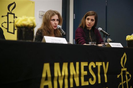 Russian punk rock band Pussy Riot members Nadezhda Tolokonnikova (R) and Maria Alyokhina hold a news conference in New York February 4, 2014 Russian punk rock band Pussy Riot members Nadezhda Tolokonnikova (R) and Maria Alyokhina hold a news conference in New York February 4, 2014