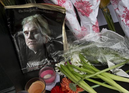 A copy of a New York Times Magazine with a photo of movie actor Philip Seymour Hoffman on the cover is pictured as part of a makeshift memor A copy of a New York Times Magazine with a photo of movie actor Philip Seymour Hoffman on the cover is pictured as part of a makeshift memor