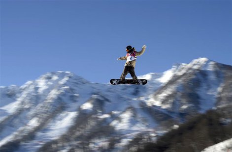 Snowboarder Roope Tonteri of Finland performs a jump during slopestyle snowboard training at the 2014 Sochi Winter Olympics in Rosa Khutor, Snowboarder Roope Tonteri of Finland performs a jump during slopestyle snowboard training at the 2014 Sochi Winter Olympics in Rosa Khutor,