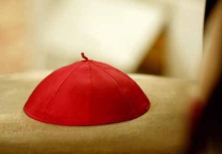 A cardinal's cap lies on a chair during a ceremony in St. Peter's Basilica presided over by Pope John Paul II April 21, 2002. A cardinal's cap lies on a chair during a ceremony in St. Peter's Basilica presided over by Pope John Paul II April 21, 2002.
