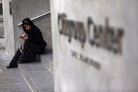 A woman uses a smartphone in the financial district in San Francisco, California November 6, 2013. REUTERS/Robert Galbraith A woman uses a smartphone in the financial district in San Francisco, California November 6, 2013. REUTERS/Robert Galbraith
