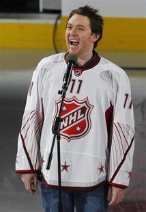 Performer Clay Aiken sings the U.S. anthem before the NHL All-Star hockey game in Raleigh, North Carolina, January 30, 2011. REUTERS/Shaun B Performer Clay Aiken sings the U.S. anthem before the NHL All-Star hockey game in Raleigh, North Carolina, January 30, 2011. REUTERS/Shaun B