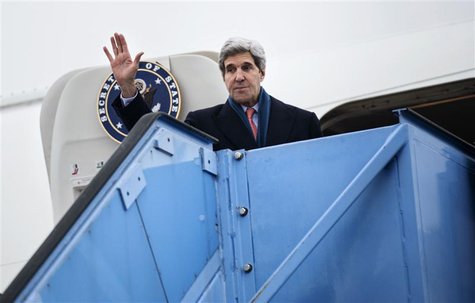 U.S. Secretary of State John Kerry waves while boarding his plane at Franz-Josef-Strauss Airport in Munich, southern Germany, February 2, 20 U.S. Secretary of State John Kerry waves while boarding his plane at Franz-Josef-Strauss Airport in Munich, southern Germany, February 2, 20