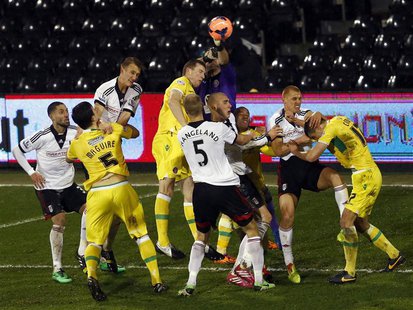 Sheffield United goalkeeper David Stockdale (C) punches the ball clear during their English FA Cup soccer match against Fulham at Craven Cot Sheffield United goalkeeper David Stockdale (C) punches the ball clear during their English FA Cup soccer match against Fulham at Craven Cot
